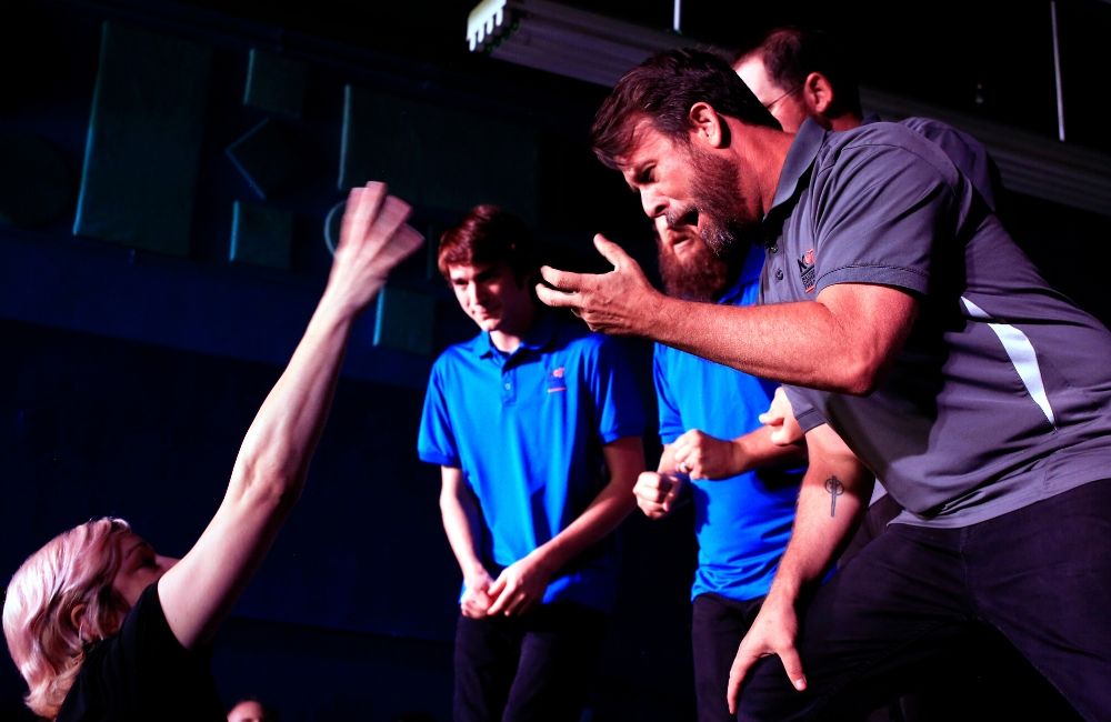 Group of comedians performing on stage at Neighborhood Comedy Theatre in Downtown Mesa, East Valley for All Ages Competitive Comedy show