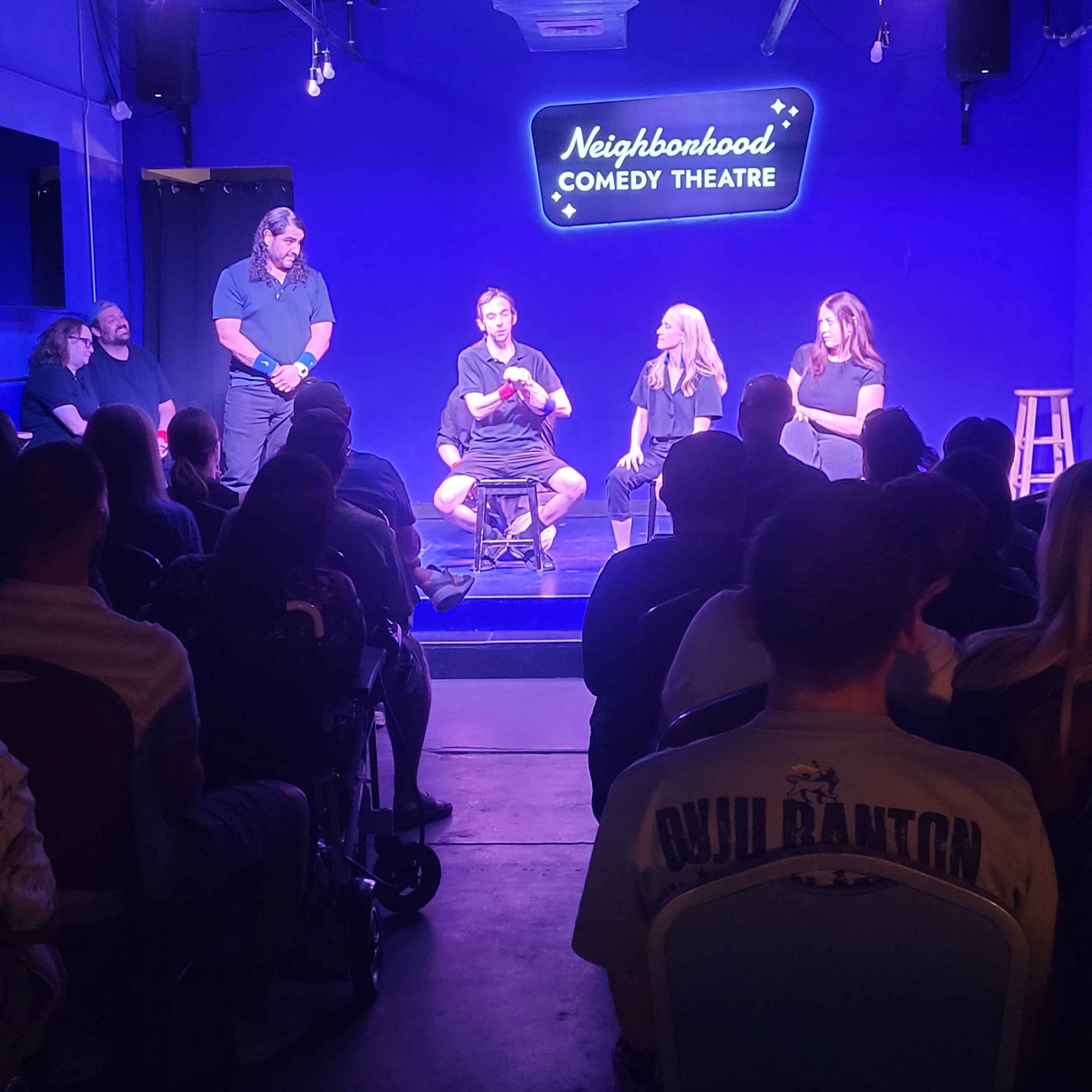 Two improv teams competing for audience votes at the Competitive Comedy Show, Neighborhood Comedy Theatre, downtown Mesa, AZ.